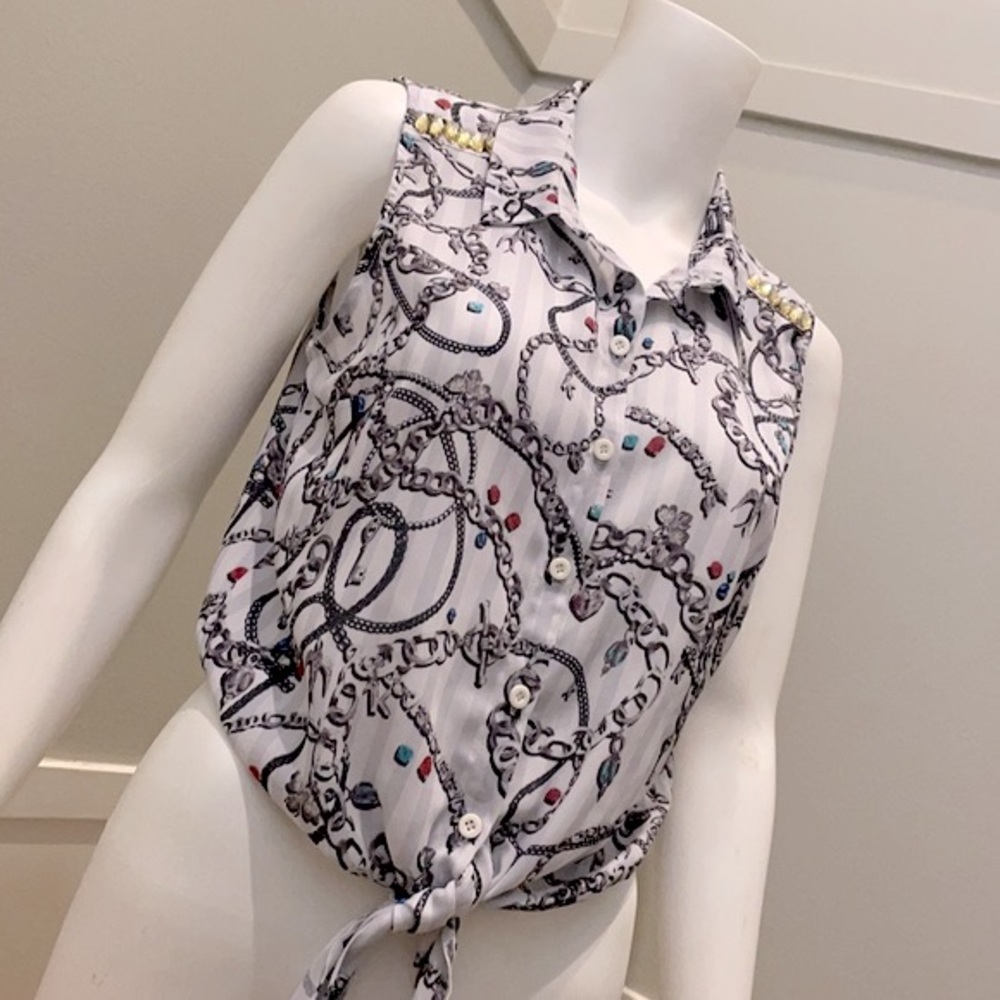 H&M Conscious button up sleeveless blouse. Knot tie front. Size 8 medium.